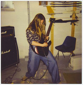 Matt with Charvel guitar
