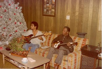 Xmas morning (1978) 18-yr-old Augi playing Blues with his grandfather
