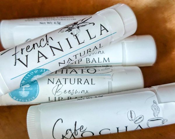 Several all natural beeswax lip balms