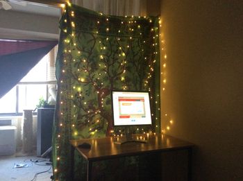 The little desk set in a corner of the director's apt
