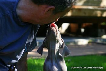 Giving Daddy, Gary, a kiss.
