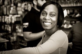 "I smile, even when it hurts." Lakeisha, Patapsco Mart, 439 Patapsco Avenue
