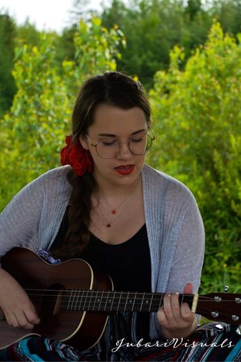 Reade playing her treasured baritone ukulele
