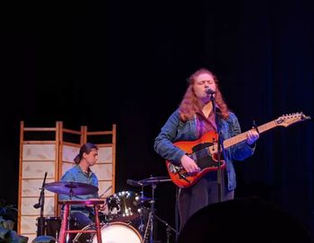 Photo by Maisie Gilbert featuring Tyler McDonald on drums
