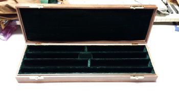 Double traverso case with dark green velvet interior.
