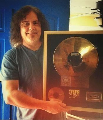 This is the actual certified gold record for "Midnight Confessions". Sweet!
