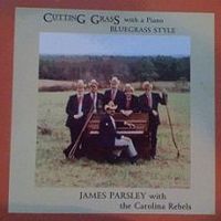 Cutting Grass With A Piano by The Carolina Rebels