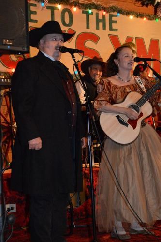 Singin' at the the Texas Cowboy Christmas Ball, backed up by Michael Martin Murphey's 'Rio Grande Band' in Anson, Texas, 2012. (see steel guitar great, Herb Steiner, behind Miss Devon)
