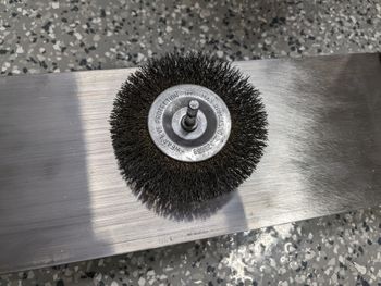 Brass wheel brush; moved to a cone later.
