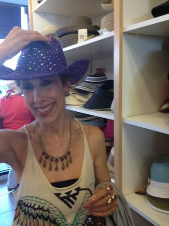 A dear soul suggested that I wear a purple hat because, "The color will keep you grounded and help keep your thoughts in". So, when I discovered this sequined purple cowboy hat, I tried it on  in her honor!

