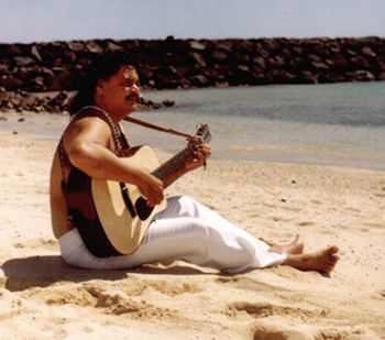 Waikiki Beach, Hawaii This photo was taken on the beach at Waikiki, entertaining tourists and preparing for a concert with Israel Kamakawiwiaole (a.k.a. “Bruddah IZ”). Later on that evening, Jerome performed with the Makaha Sons of Ni’hau at Aloha Tower.
