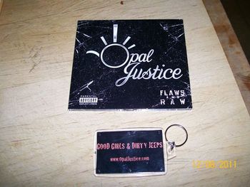 This is a pic that Lee Roy posted of the Flaws & Raw CD and the GG&DJ key chain that he ordered.
