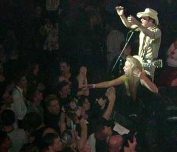 Xander on stage with Cherie Curie of The Runaways
