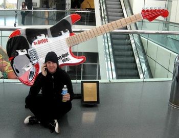 Kneeling down at the Rock & Roll Hall of Fame altar
