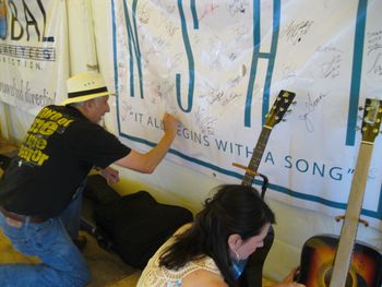 Good friend and fellow KC songwriter Jim Thomas signs the banner
