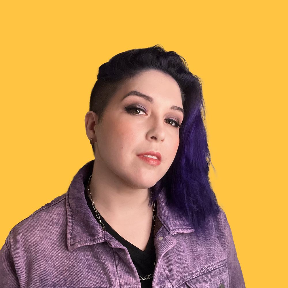 Kit Citrine in a purple jean jacket