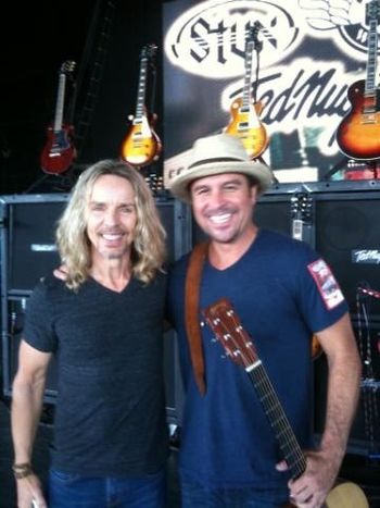 Chris Sanchez and Tommy Shaw (Styx) on stage during line check
