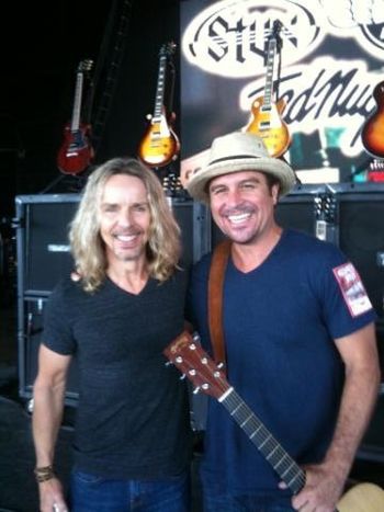 Chris Sanchez and Tommy Shaw (Styx) on stage during line check
