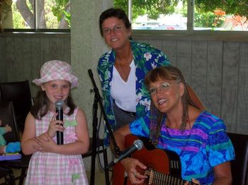 Cindy cheers GraMarsha and little Bri Joy on as the sing a duet in church.
