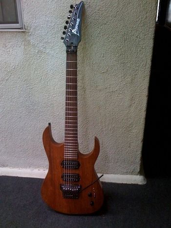 Ibanez RG 7 String Copy. Body: Mahogany Neck: 2 pieces of quarter sawn maple Neck Joint: Bolt On Headstock Angle: 10 Degrees Scale: 25.5 Frets: 24 Fretboard: Rosewood Nut: Locking (Cosmo Black) Bridge: Ibanez Edge Pro 7 (Cosmo Black) Tuning Keys: Gotoh (Cosmo Black) Controls: 1 Volume, 1 Tone, 3 Way Switch Pots: Two 500K Pickups: Seymour Duncan JB and Jazz
