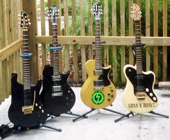Fernandes Guitars:(Left to Right) Dragonfly Elite, Marilyn Mansons Prototype Monterey, Monterey Standard, and Native.
