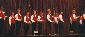 Susan Black sang lead for Boy From New York City.
