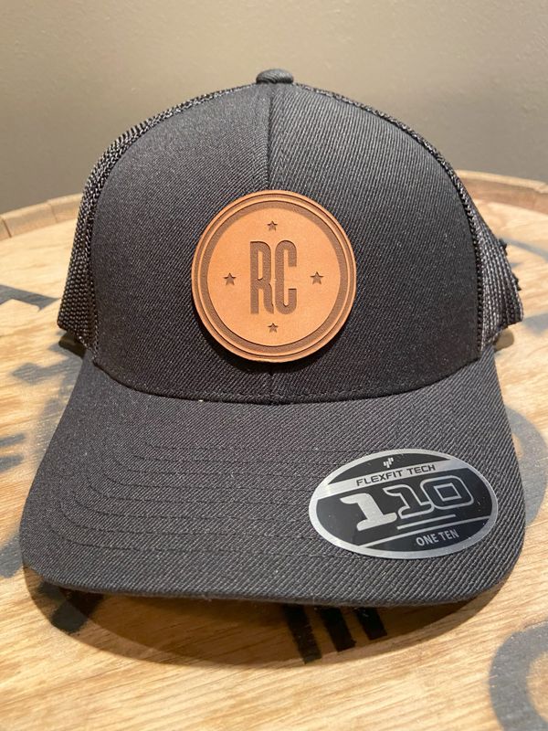 Hat Black with a Round Tan Patch