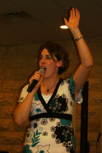 Belinda is getting into the song and worship.
