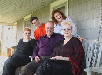Sitting on Pastor Bud's swing on the porch. L-R: Aunt Linda, me, Bud Rogers, Mom, Ana.
