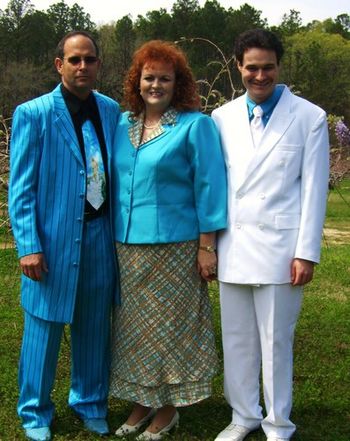Dad, Mom, and myself in our Easter frock in 2008.
