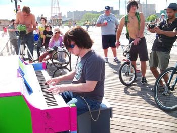 Playing a summer popup piano at Coney Island 2011. This one was painted by Anthony Zito.
