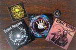 The Lone Rager / Brush with Death / Skippng Over Damaged Area signed CD’s + Sticker + Badge