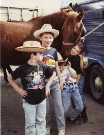 Tony ( with horse) and his cousins at his first rodeo. I lost him and when I found him he was rubbing faces with this horse. The owner said the horse was not friendly but took to Tony right away.
