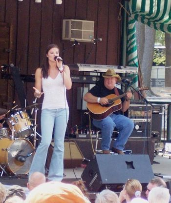 Joe and Ayla Brown at the Indian Ranch main stage before the Tracy Lawrence show.
