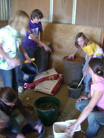 Joy teaches the kids how to make up a bran mash.
