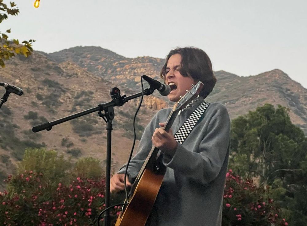 Cash performing at the Photogenics private fundraiser for the Boys and Girls Club 