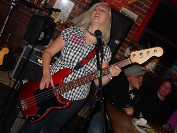 Tracy rocking the red bass.

