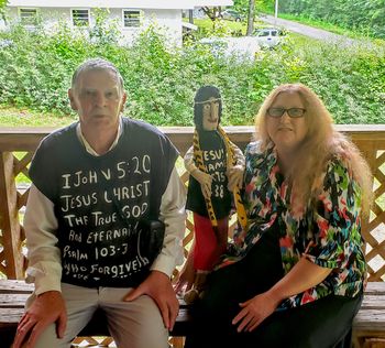 Jimmy and Pam with a snake handling doll
