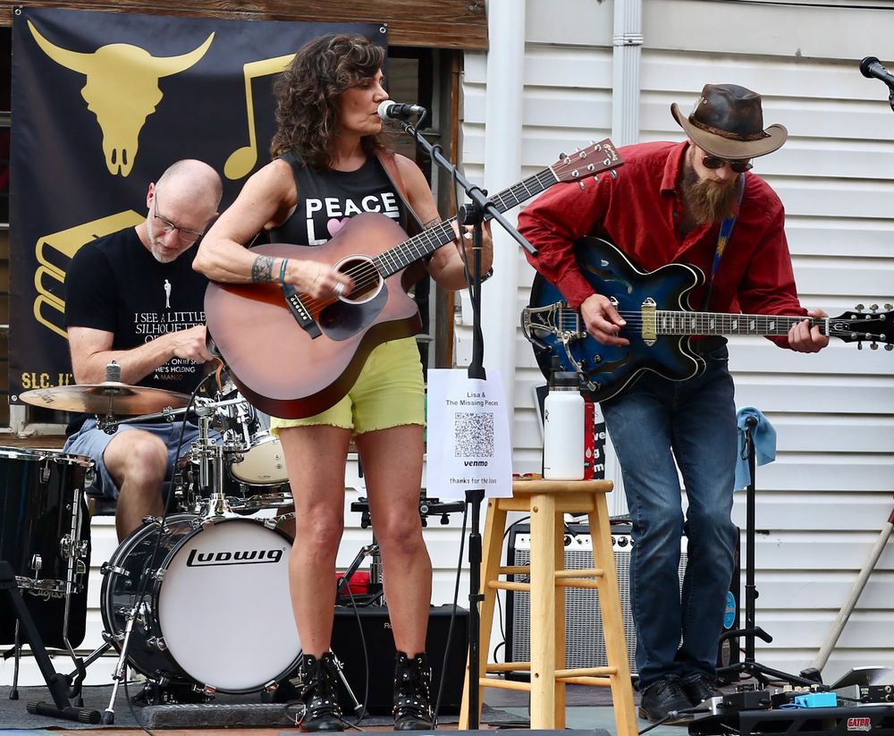 4 musicians posing