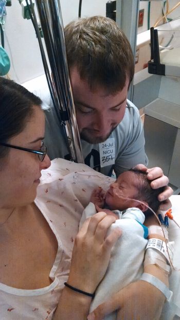 William Andrew James Wallis with Parents Kyle and Jordin Wallis. Congratulations!
