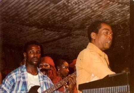 Kaleta playing guitar in the band with Afrobeat legend Fela Kuti 1970s at The Shrine, West Africa