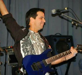 Gene O. performing at his Tiffany rock band reunion party
