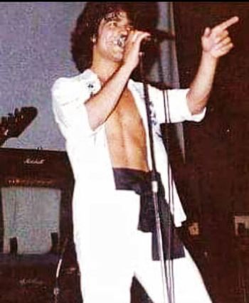 Gene O. performing with his rock band, TIFFANY
