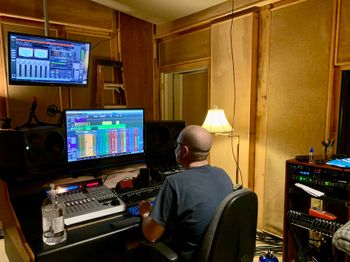 Dustin Delage mastering the album
