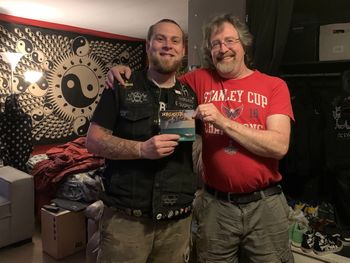Guitarist Andrew McKnight hand delivered a freshly arrived CD to Matt's son Alex.
