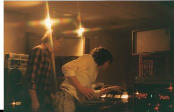 1989 - the recording begins on 4-track cassette at Stonehouse Studios. Engineer Pat Mills watching Andrew McKnight inspecting the settings.
