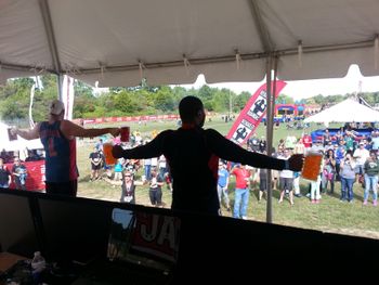 2 men trying to hold on. Rugged Maniac 2014.
