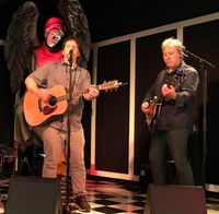 Dan Israel and Mike Lane play at a private party in Minneapolis