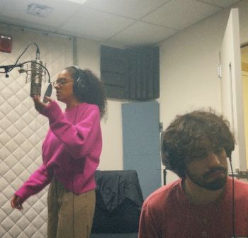 Akimi recording her vocals, with Elie always listening intently, making sure to capture the best takes.
