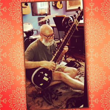 Randy playing Sitar while recovering from cancer
